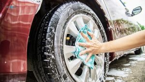 Wash the tires with white-wall tire cleaner