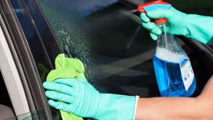 Wipe clean windows and mirrors with glass cleaner